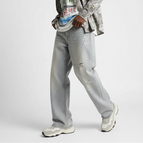 Model wearing Distressed Baggy Jeans